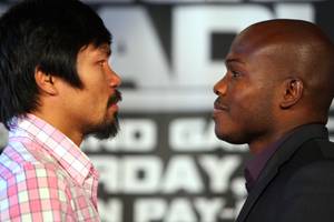 WBO welterweight champion Manny Pacquiao, left, and undefeated WBO junior welterweight champion Timothy Bradley Jr. face off during a press conference in New York City Thursday during a cross-country media tour for their upcoming welterweight title fight. Pacquiao vs Bradley will take place June 9 at the MGM Grand Grand Garden Arena in Las Vegas.